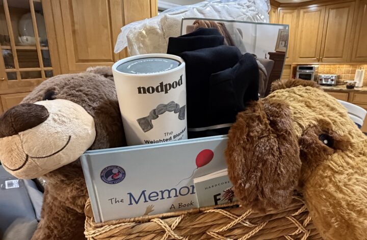 Thoughtfully arranged grief basket with comfort items and personal touches